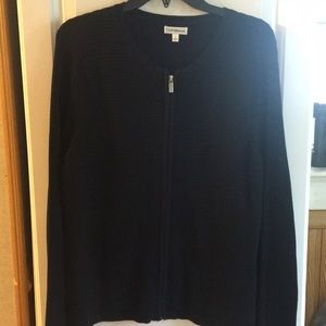 Black textured sweater, full zipper.